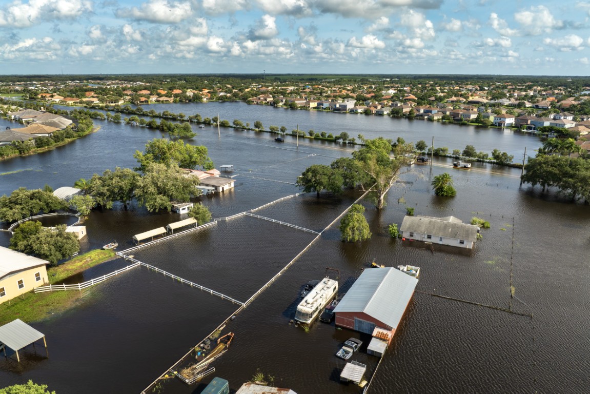 A flooded residential and agricultural area